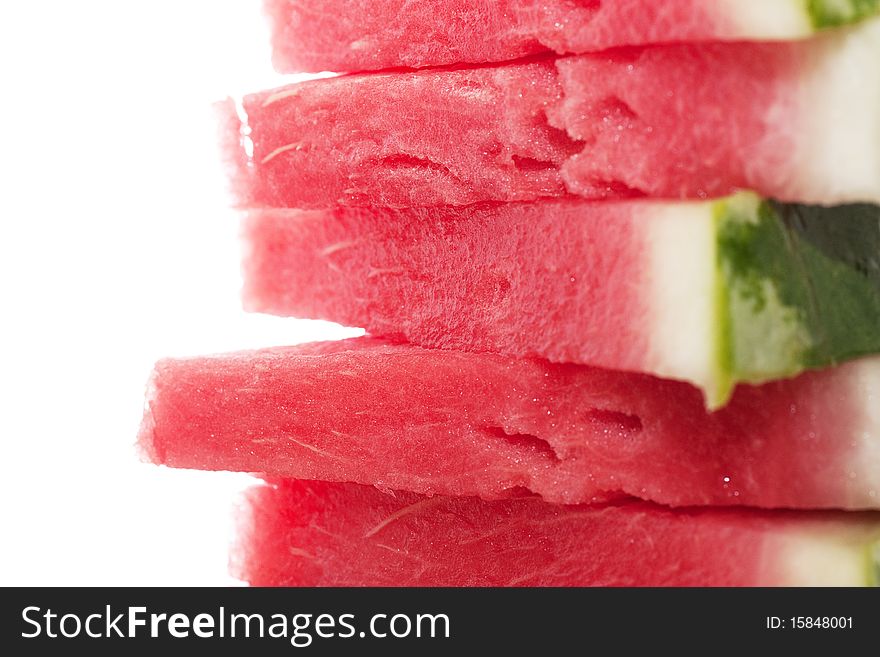 Five pieces of watermelon isolated over white. Five pieces of watermelon isolated over white.