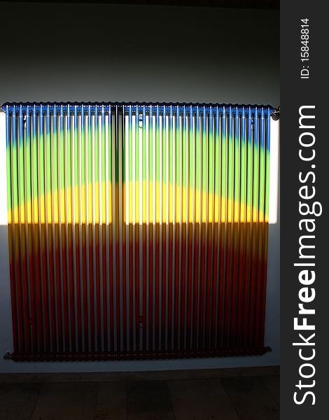 Colorful radiator in a school in the sunlight