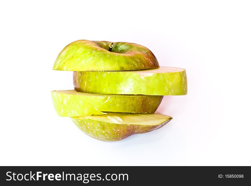 Fresh green apple slices isolated