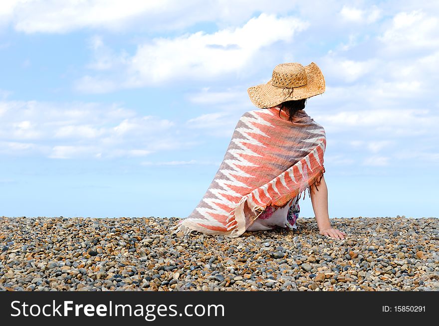 Young woman on the beach. North sea.