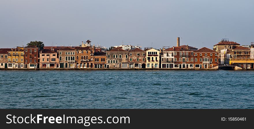 Row Of A Houses On A Bank