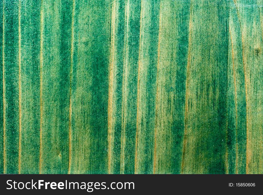 Texture of an old wooden fence green