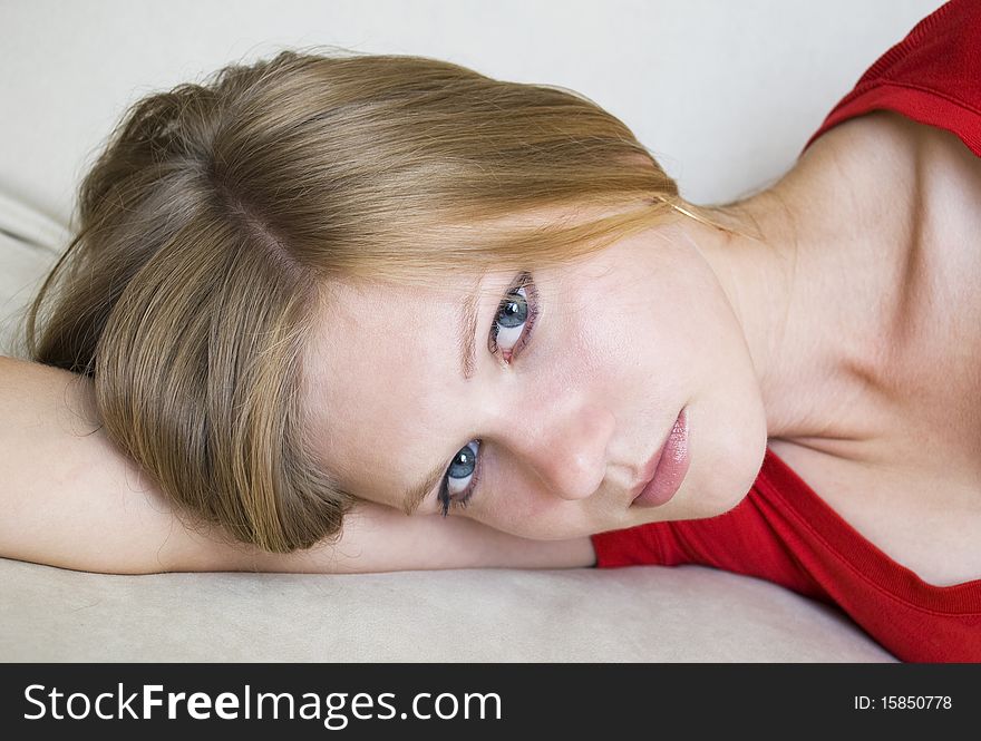 Beautiful Dreamy Girl Lying On Her Hand