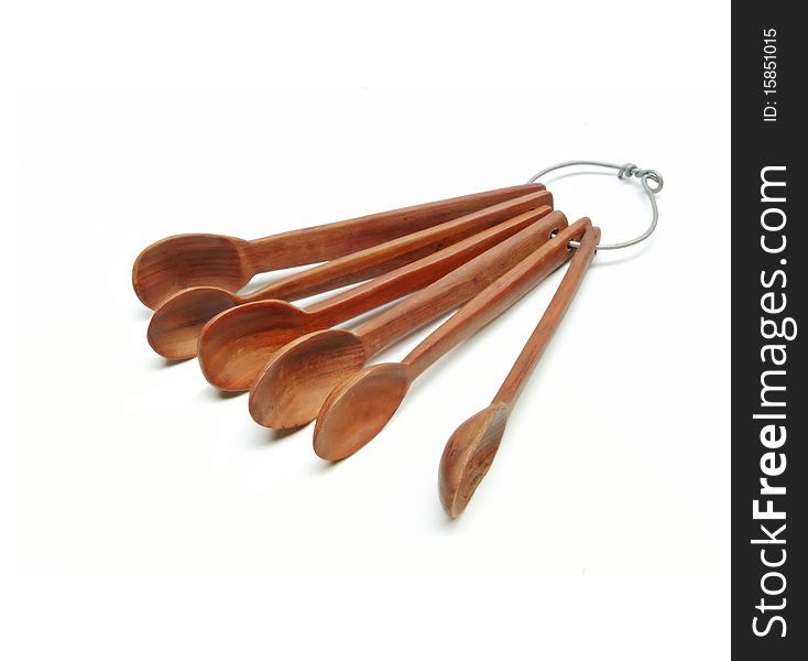A group of handcrafted wooden spoons for cooking. A group of handcrafted wooden spoons for cooking