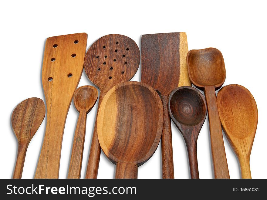 A group of handcrafted wooden spoons for cooking. A group of handcrafted wooden spoons for cooking