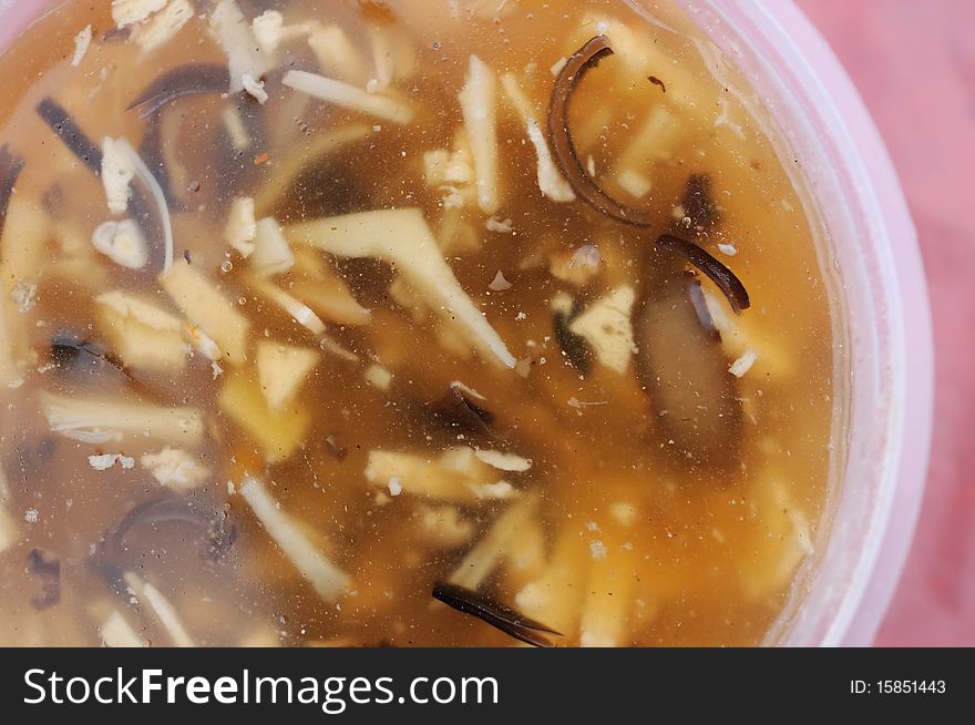 Chinese vegetarian sharks fin soup cooked with various vegetables, mushrooms, and mock meat. For food and beverage, and international cuisine concepts.