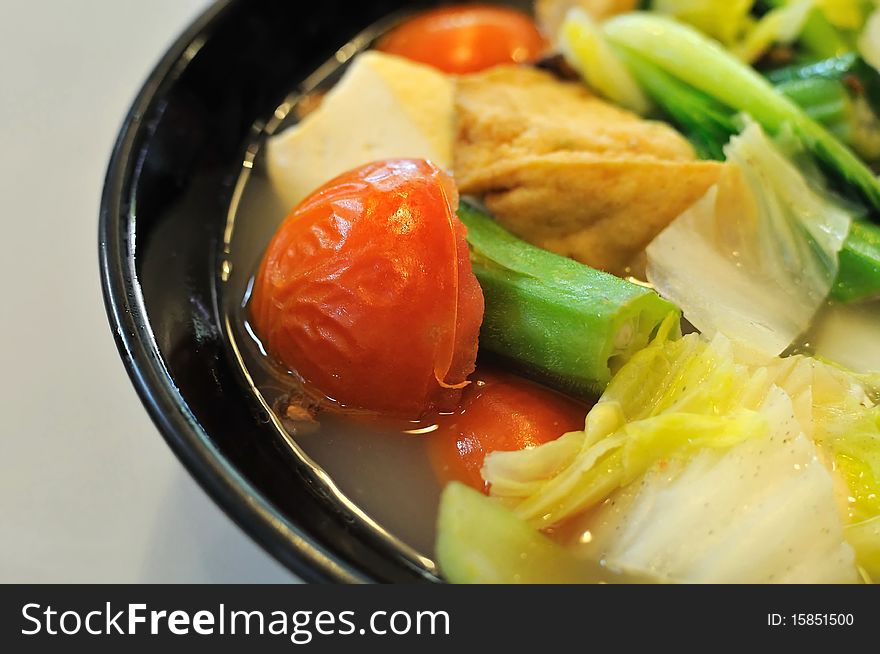 Chinese vegetable soup consisting of mixed vegetables. Suitable for concepts such as diet and nutrition, healthy eating and lifestyle, and food and beverage.