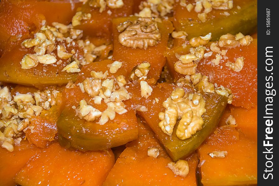 Close up shot of pumpkin desert with walnuts. Close up shot of pumpkin desert with walnuts