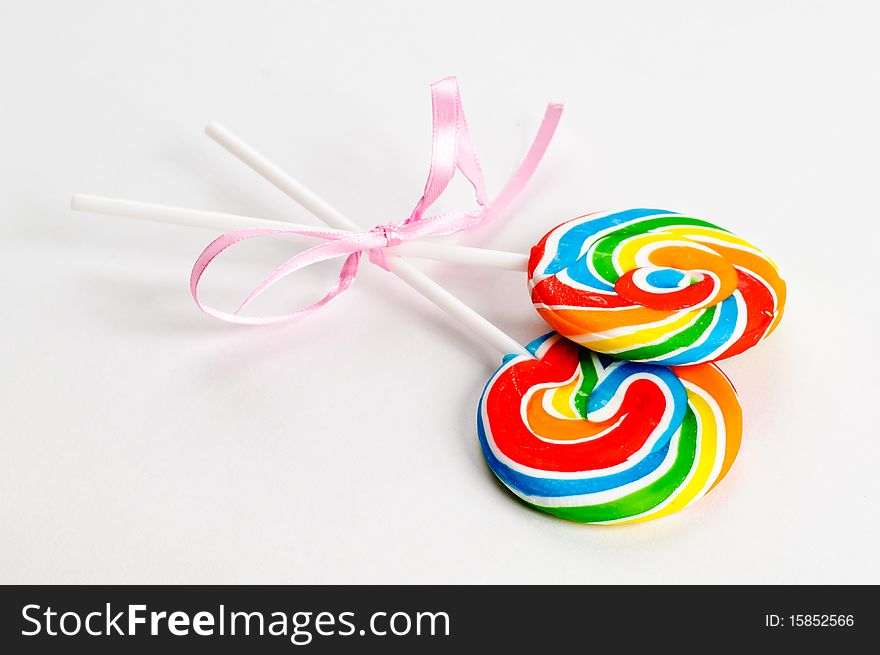 A couple of lollipops on a white background