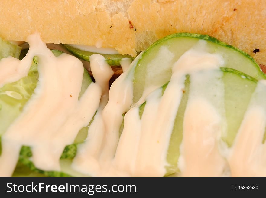 Close up of healthy vegetable burger with mayonnaise topping. Suitable for concepts such as diet and nutrition, healthy eating and lifestyle, and food and beverage.