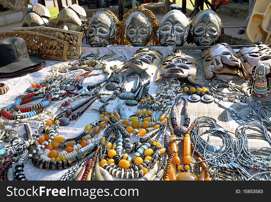 South Africa market stall with masks, necklaces for toursits