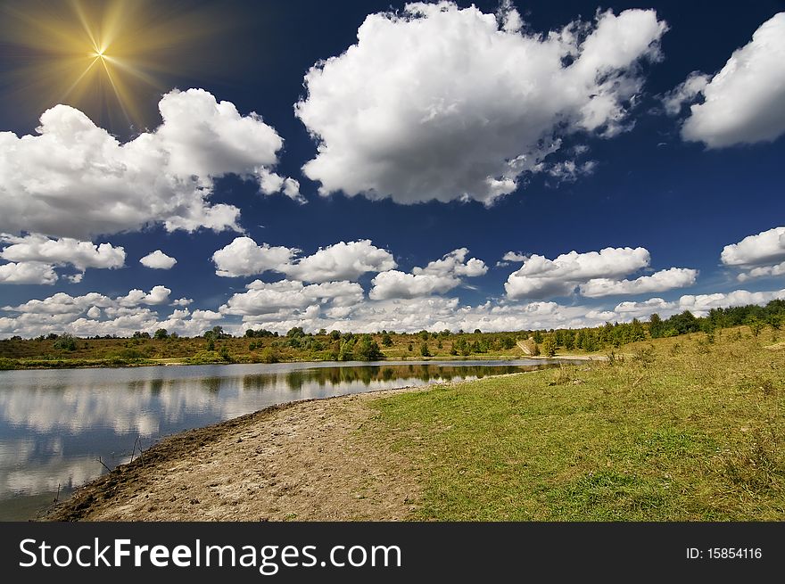 Wonderful View Lake And Autumnal Meadow.