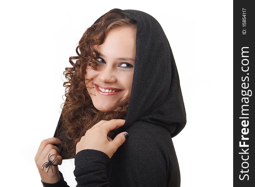 Portrait of a young smiling woman in a hood.