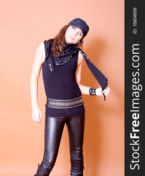 Fashion model wearing leather pants