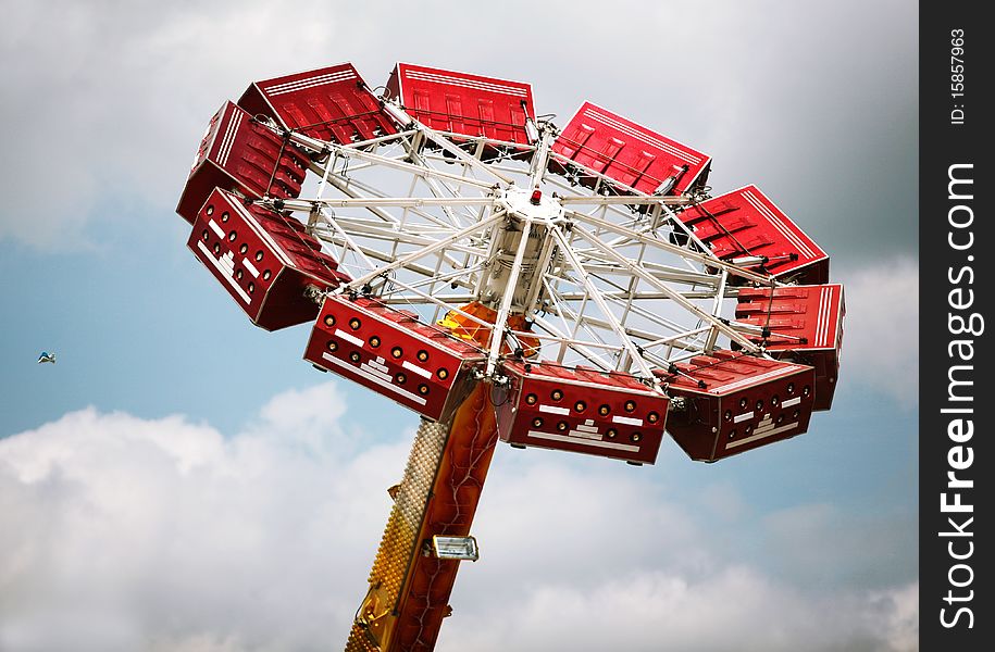 Roundabout on background of the dramatic cloudy sky. Roundabout on background of the dramatic cloudy sky