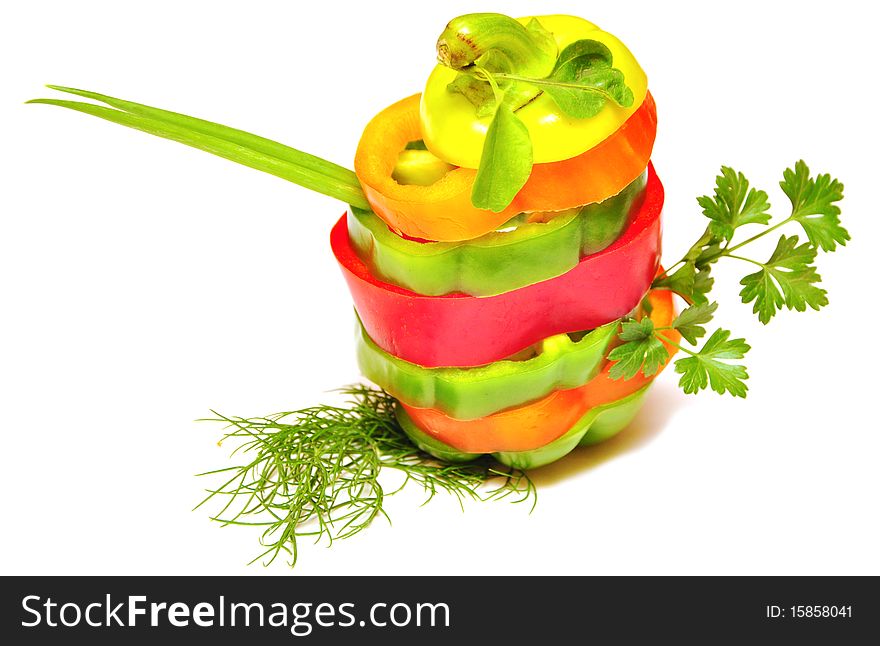 Different mixed vegetables  stacked on a white background. Different mixed vegetables  stacked on a white background