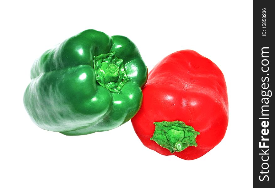 Red and green paprika on white background. Red and green paprika on white background