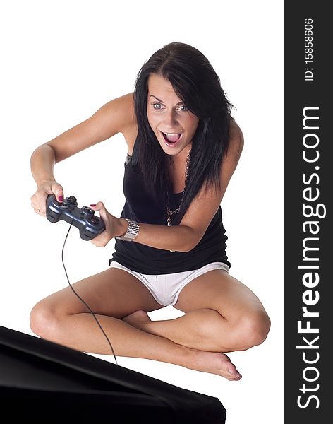 Nice girl with gamepad playing. Nice girl with gamepad playing