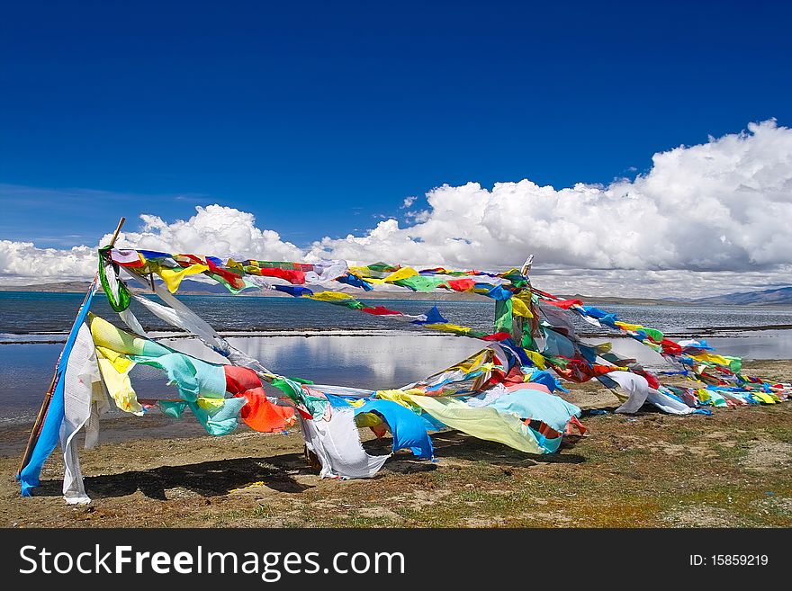 Scripture flag near the Mapam Yumco lakeã€‚The Mapam Yumco lake is one of tibet's holy lake.It is the biggest holy lake in tibet.