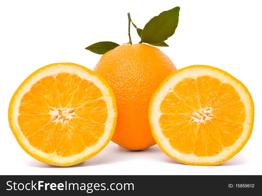 Ripe orange with leaves isolated on a white background