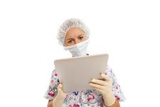 Portrait Of Young Nurse Using Computer Stock Photo