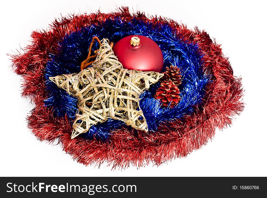 Christmas decorations lying on red and blue chains, isolated on white