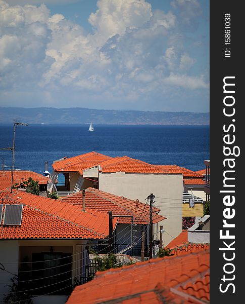 Rooftops And Sea