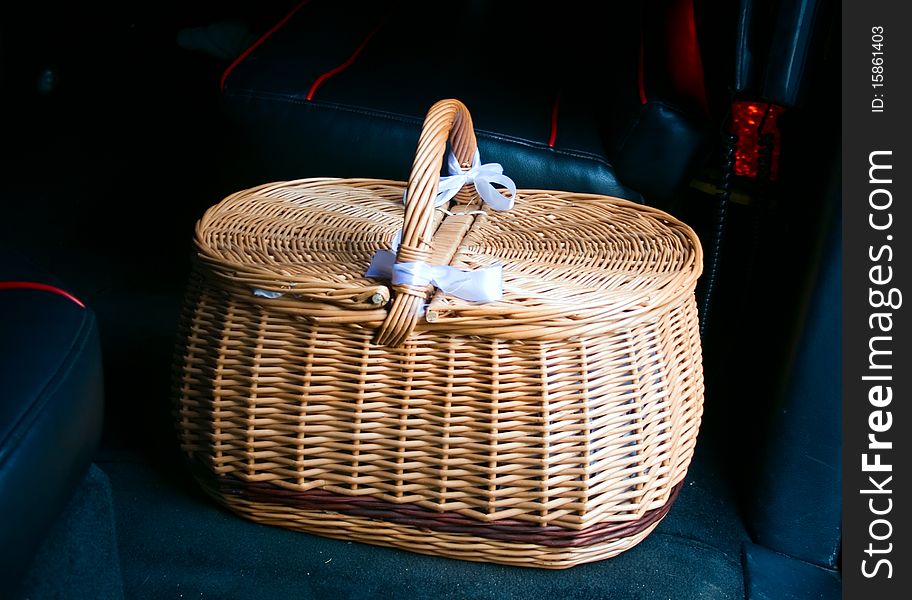 Vintage woven basket on a dark background