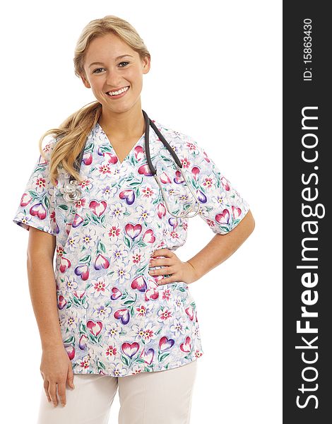 Portrait of young nurse with stethoscope in scrubs