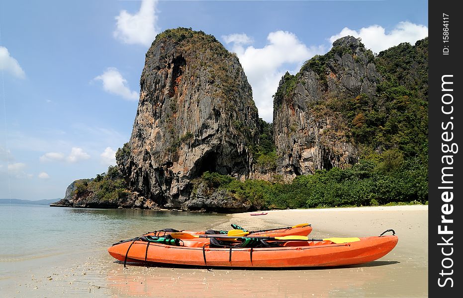 Canoe on the tropical beach. Canoe on the tropical beach