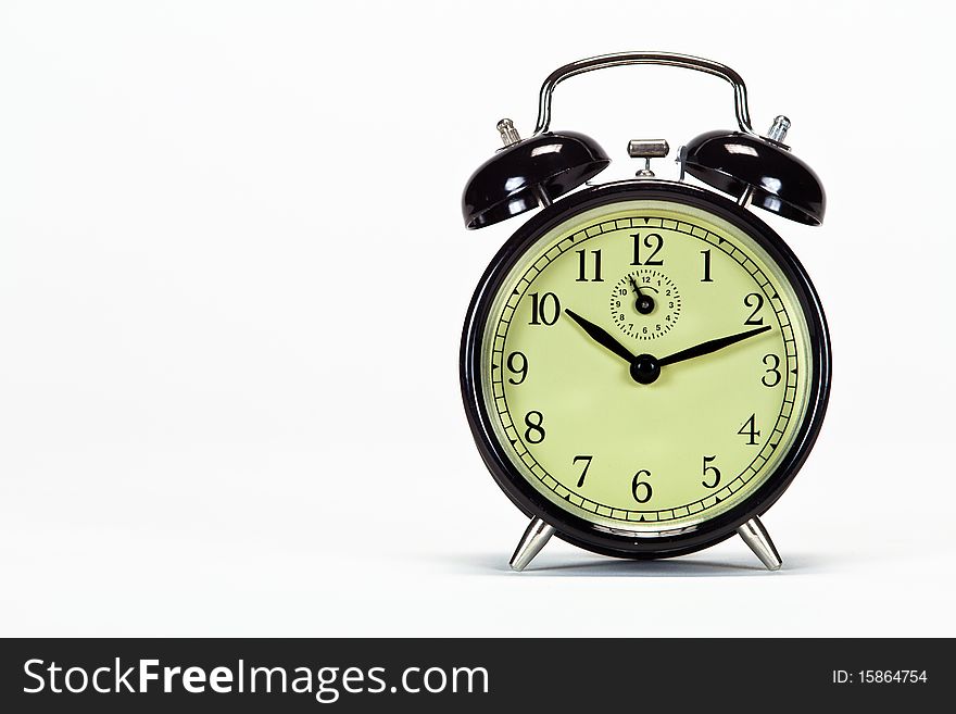 Alarm clock with look space on left side of image. Alarm clock with look space on left side of image