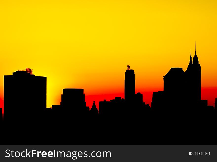 Silhouette of downtown New York City, Manhattan, financial district, at sunset. Silhouette of downtown New York City, Manhattan, financial district, at sunset.