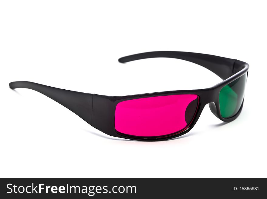 A pair of green-magenta anaglyph 3D glasses on a white background. A pair of green-magenta anaglyph 3D glasses on a white background.