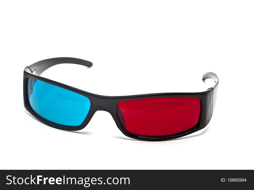 A pair of red-cyan anaglyph 3D glasses on a white background. A pair of red-cyan anaglyph 3D glasses on a white background.