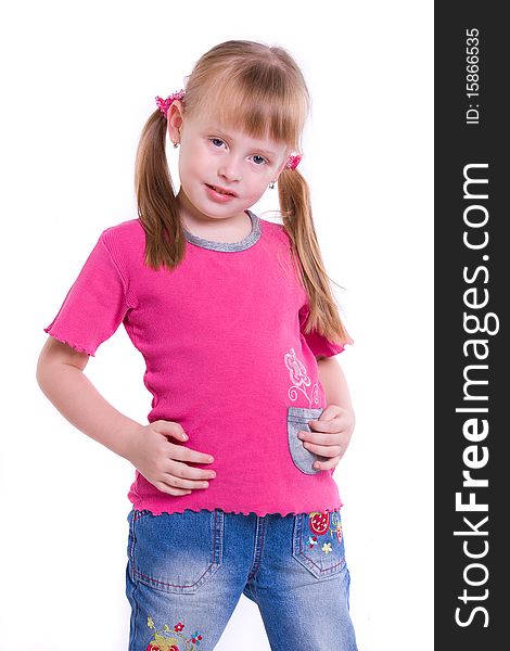 Little girl posing on front of camera. little girl in jeans on white background .four year baby, isolated white.