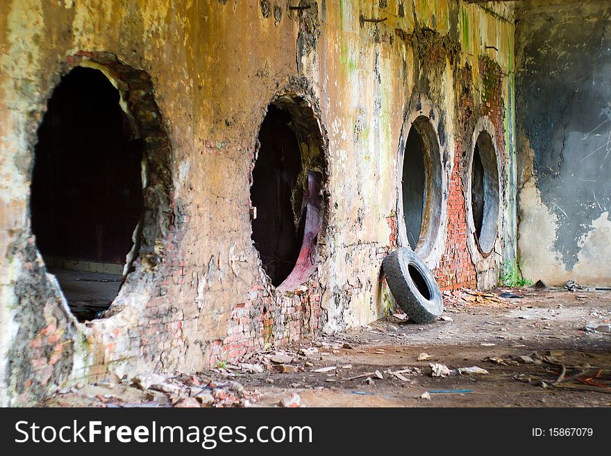 Wide angle view of an old wall abandoned factory building