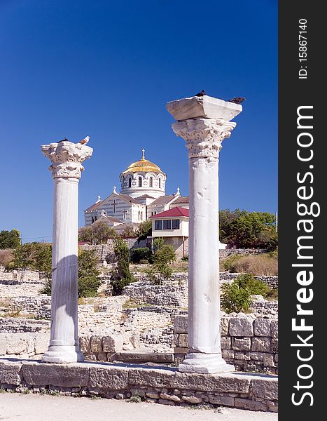 Ancient ruins against the church