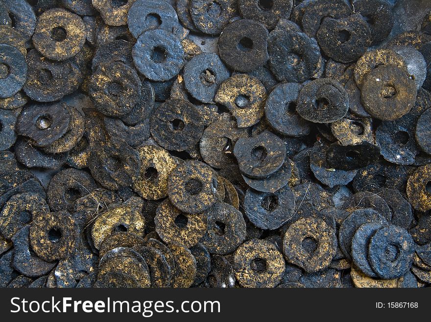 Heap Of Circular Rubber Nuts