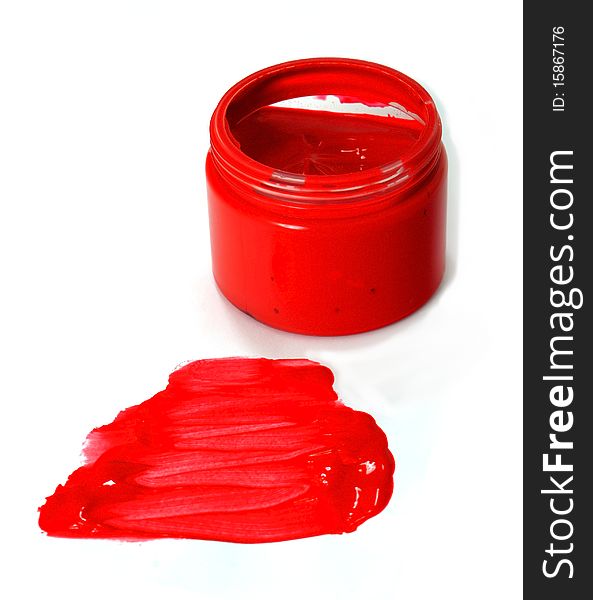 A container of red fingerpaint, with a finger painted paper in front. A container of red fingerpaint, with a finger painted paper in front