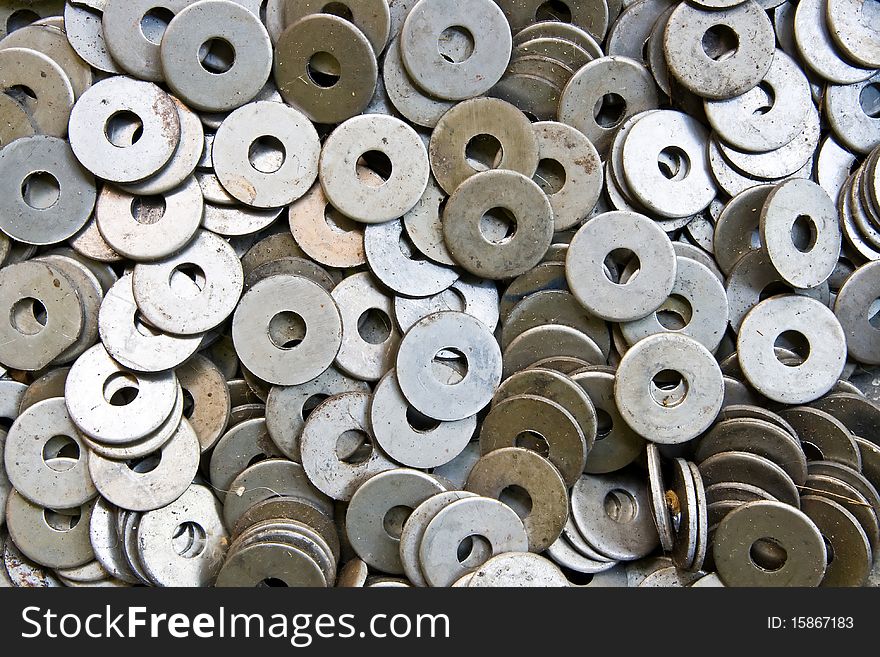 Heap Of Circular Metal Nuts