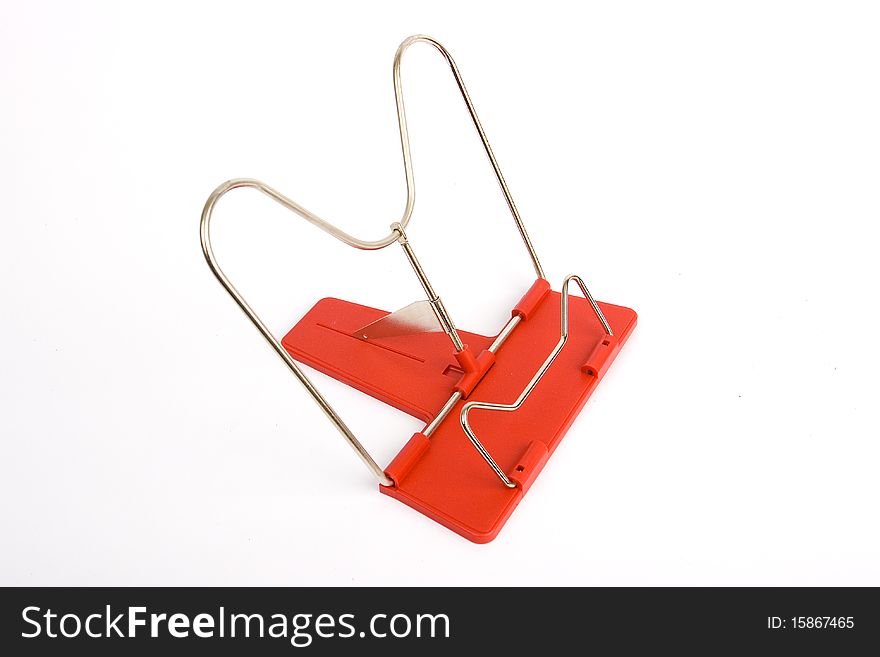 Metal bookend with the red plastic basis on a white background