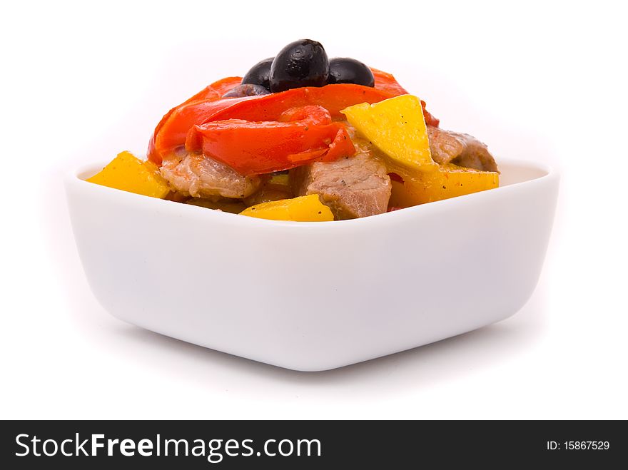 Stewed pork in fruit sauce with sweet pepper.