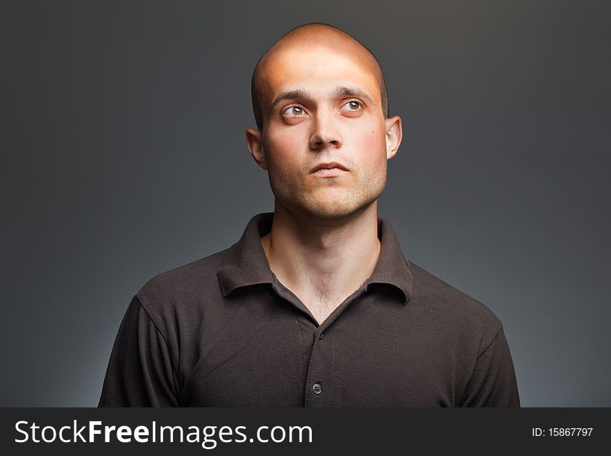 Pensive young man in shirt