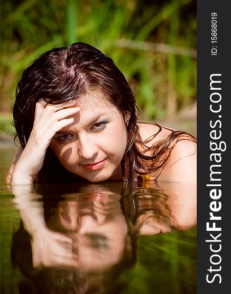 Beautiful girl in water