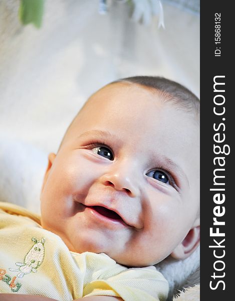 portrait of a cute baby with big smile. portrait of a cute baby with big smile