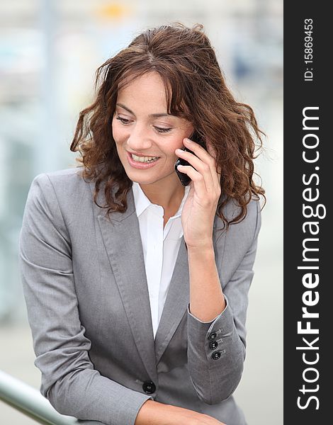 Businesswoman talking on the phone. Businesswoman talking on the phone
