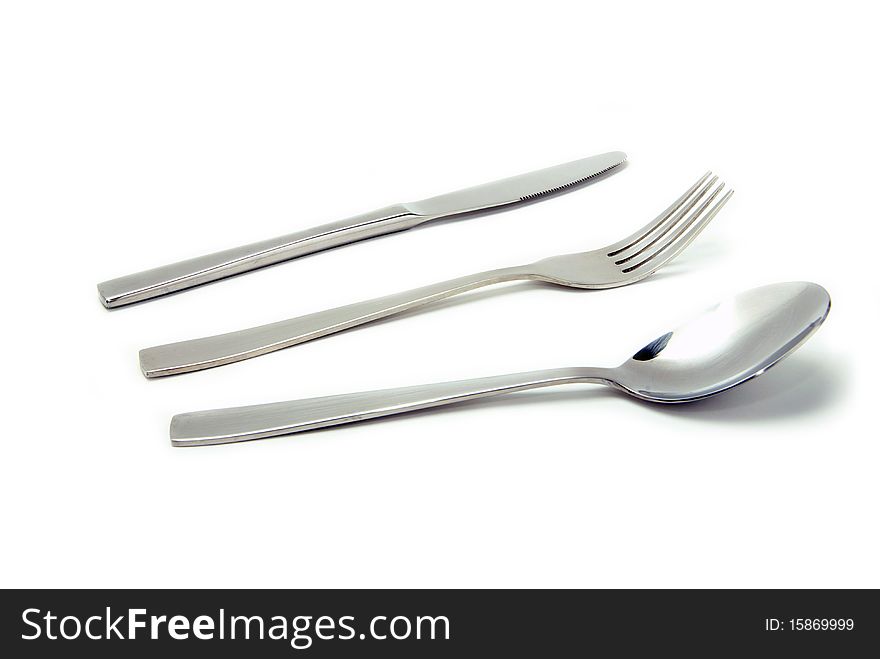 Fork, spoon and knife isolated on white background