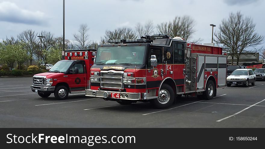 This is Bellingham Fire Engine 4 parked alongside the new Ambulance 4 &#x28;belonging to Station 4&#x29;. This is Bellingham Fire Engine 4 parked alongside the new Ambulance 4 &#x28;belonging to Station 4&#x29;.