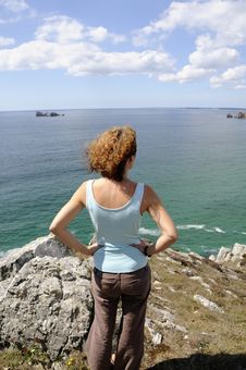 Young Woman Watching The Ocean Stock Photography Young Woman Watching The Ocean Stock Photography