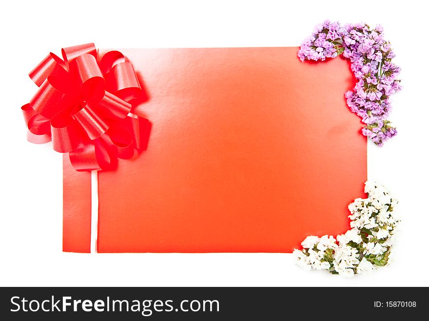 Red card with bow on white with flowers design